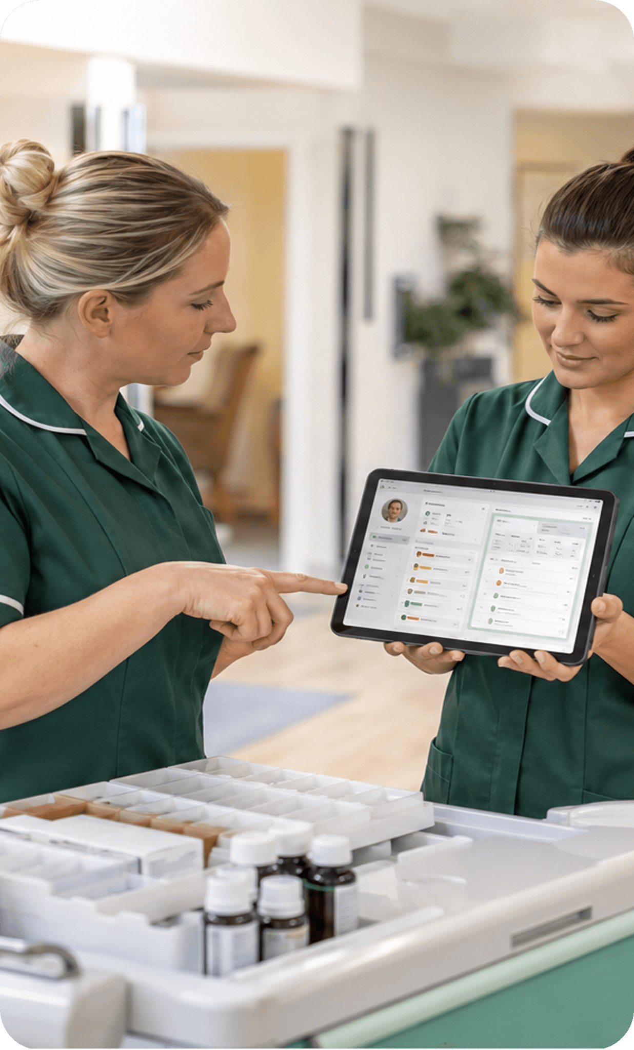 Caregiver checking tablet instructions